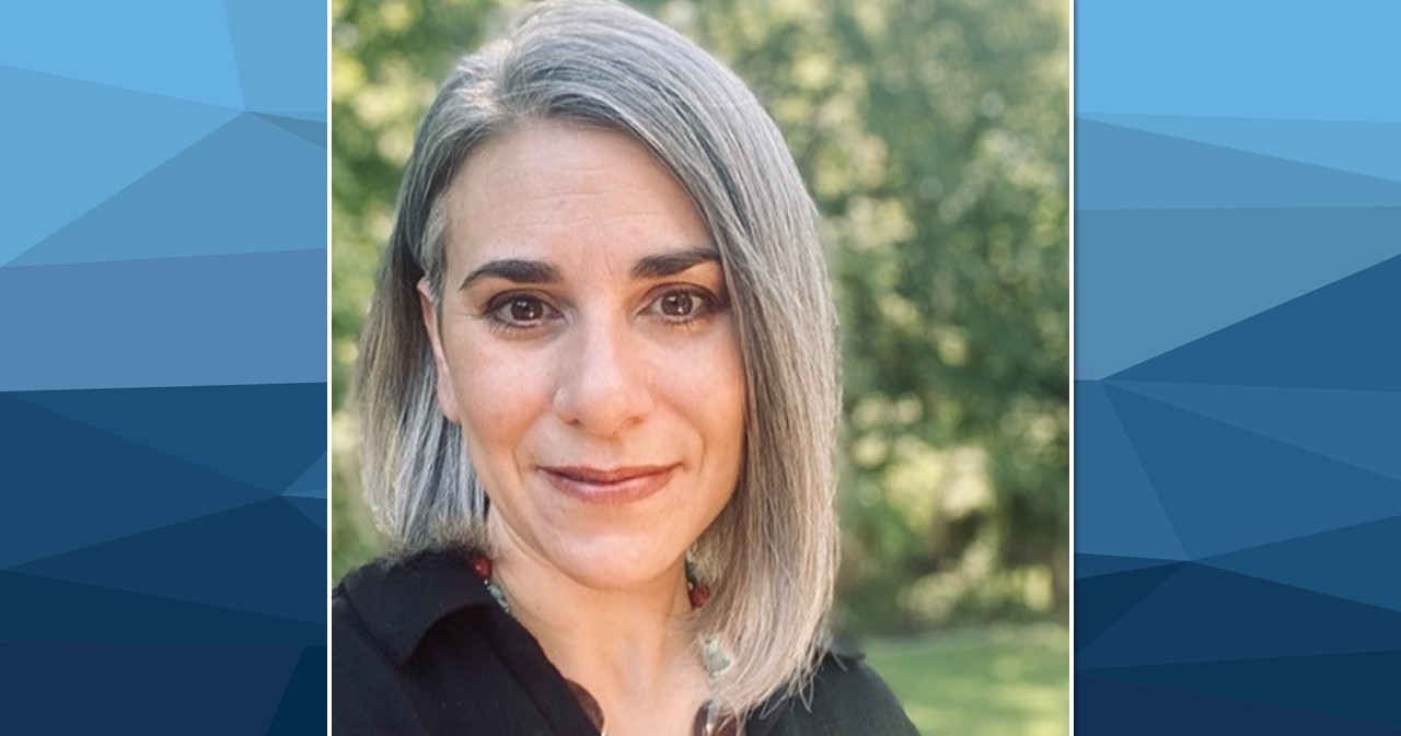 The featured image is a closeup of Sarah Hairston, in a bob haircut, looking at the camera, in a black blouse with green foliage in the background.