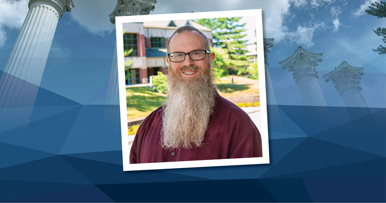 Dr. Tobias Gibson wears a burgundy shirt and poses on outside on Westminster's campus. His head shot is pictured over a blue background.