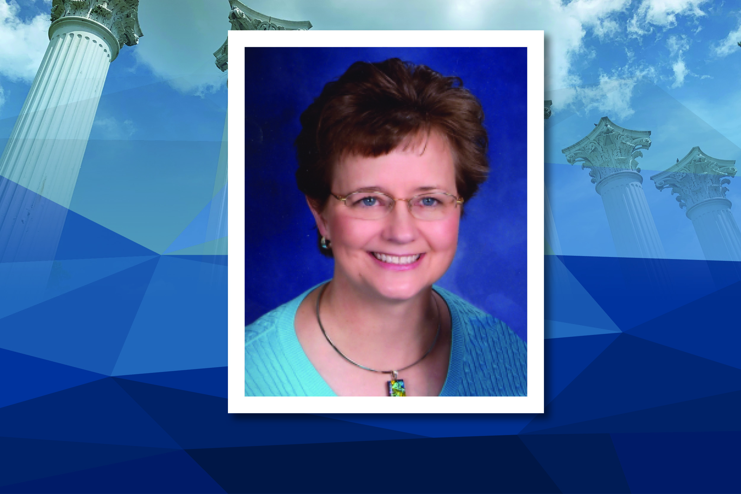 Anne Schneider is pictured in a blue shirt and glasses. Her square photo is placed over a blue rectanglular background.