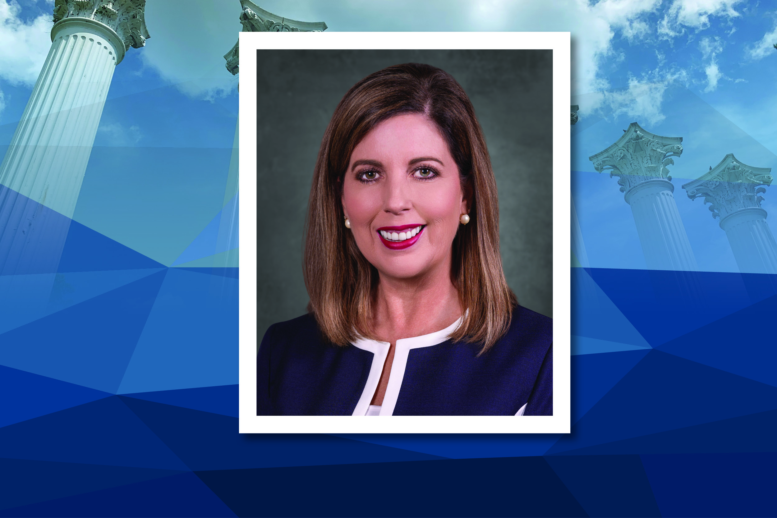 Wendy Humphrey is pictured in a navy blazer with white trim in a square photo format, surrounded by a blue rectangle.